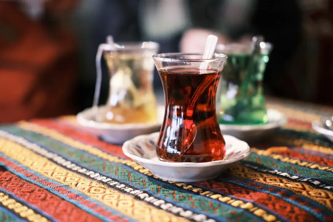 a traditional turkish tea set with delicate china and tea cups